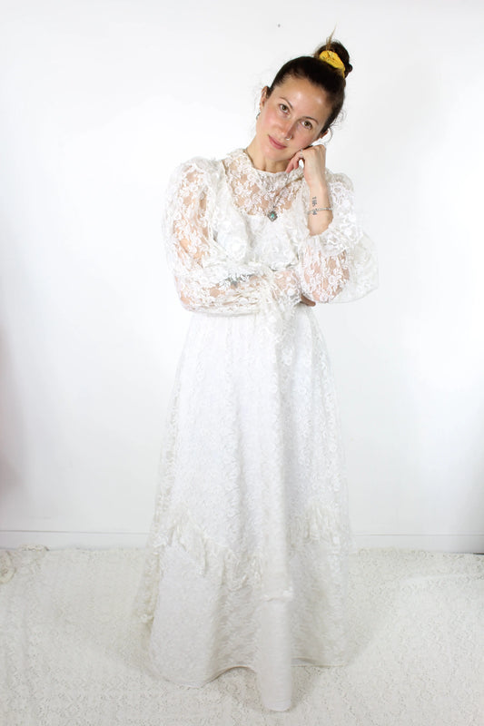 Robe de mariée vintage dentelle blanche manches bouffantes France la friperie vintage 25