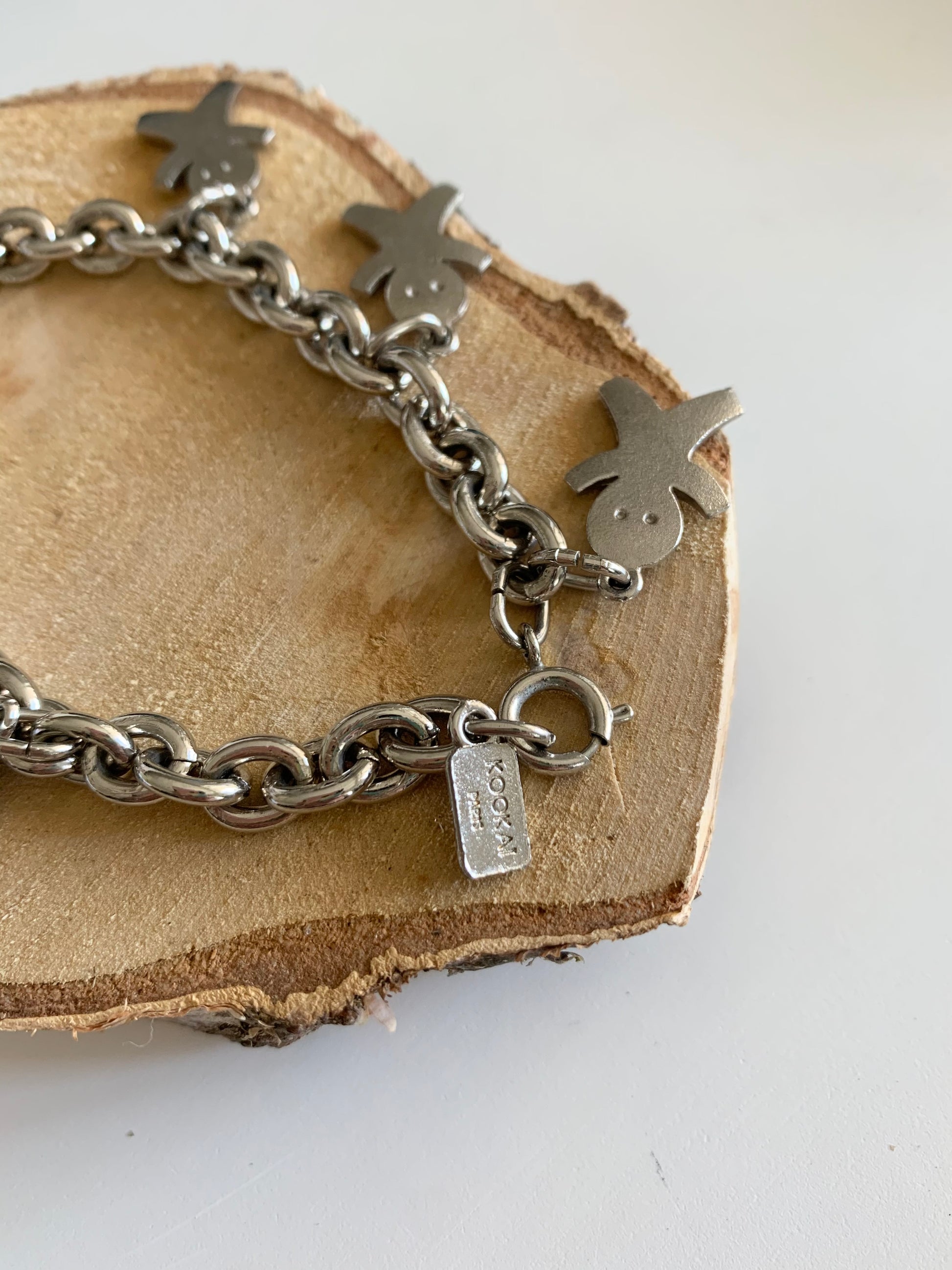 Bracelet argenté Kookai bonhomme en papier la friperie vintage 25