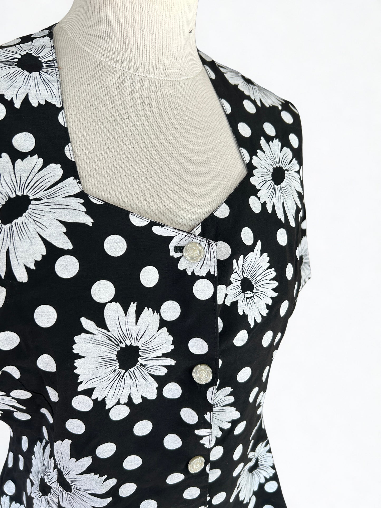 Blouse vintage pour symétrique noire à pois blanc
