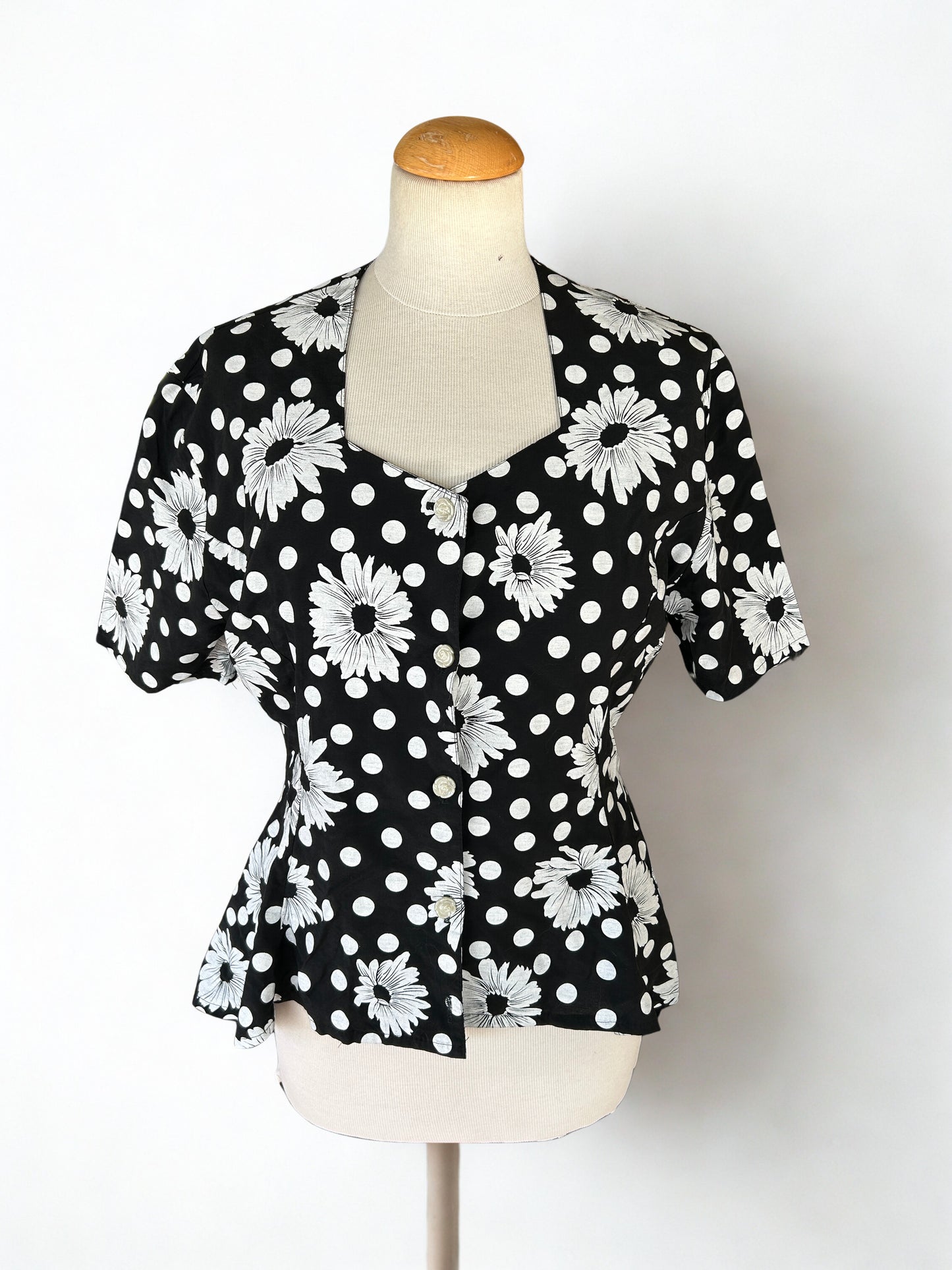 Blouse vintage pour symétrique noire à pois blanc
