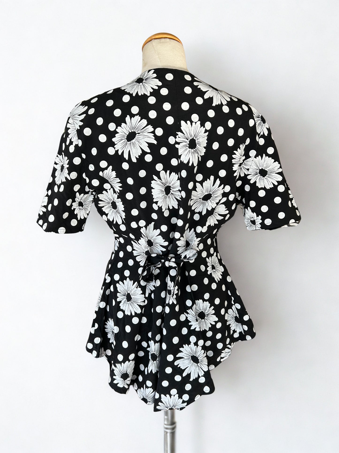 Blouse vintage pour symétrique noire à pois blanc