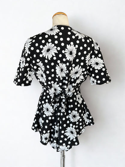 Blouse vintage pour symétrique noire à pois blanc