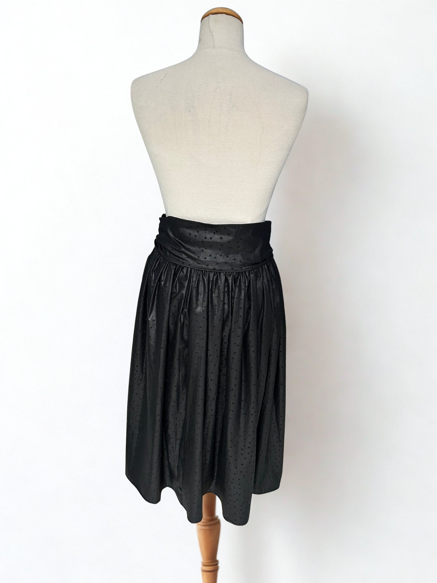 Jupe midi vintage noire en imitation cuir – taille haute