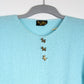 T-shirt vintage maille bleu ciel boutons chien France