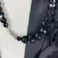Collier sautoir ancien perles à facette noires en verre