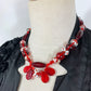 Collier vintage perles rouge en verre à fleurs