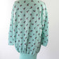 Sweat shirt robe vintage turquoise à motifs fleurs La friperie vintage
