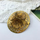 Broche ancienne ronde dentelle métal doré et fleurs décoratives