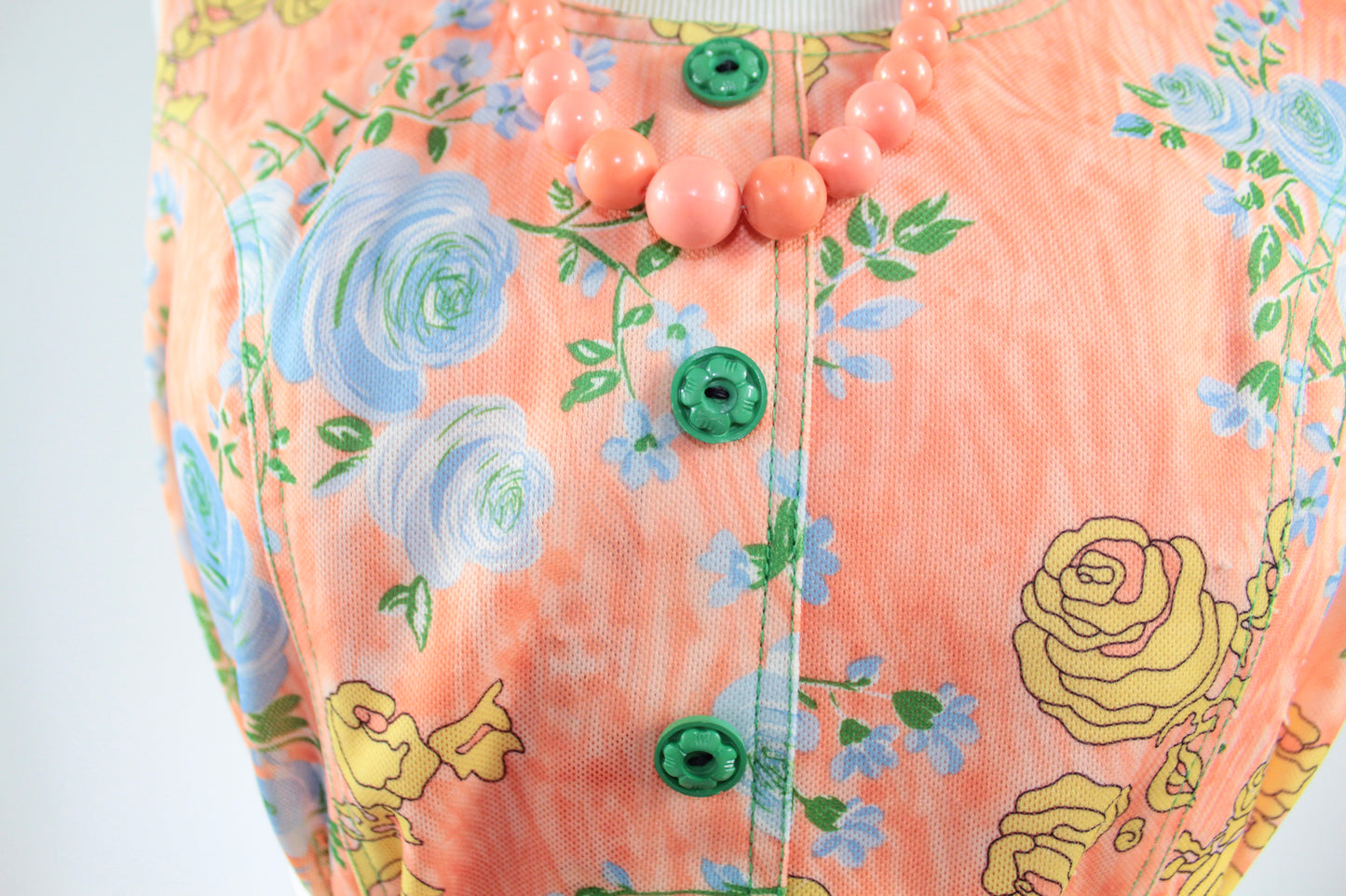 Robe vintage sans manches orange motifs fleurs colorées La friperie vintage